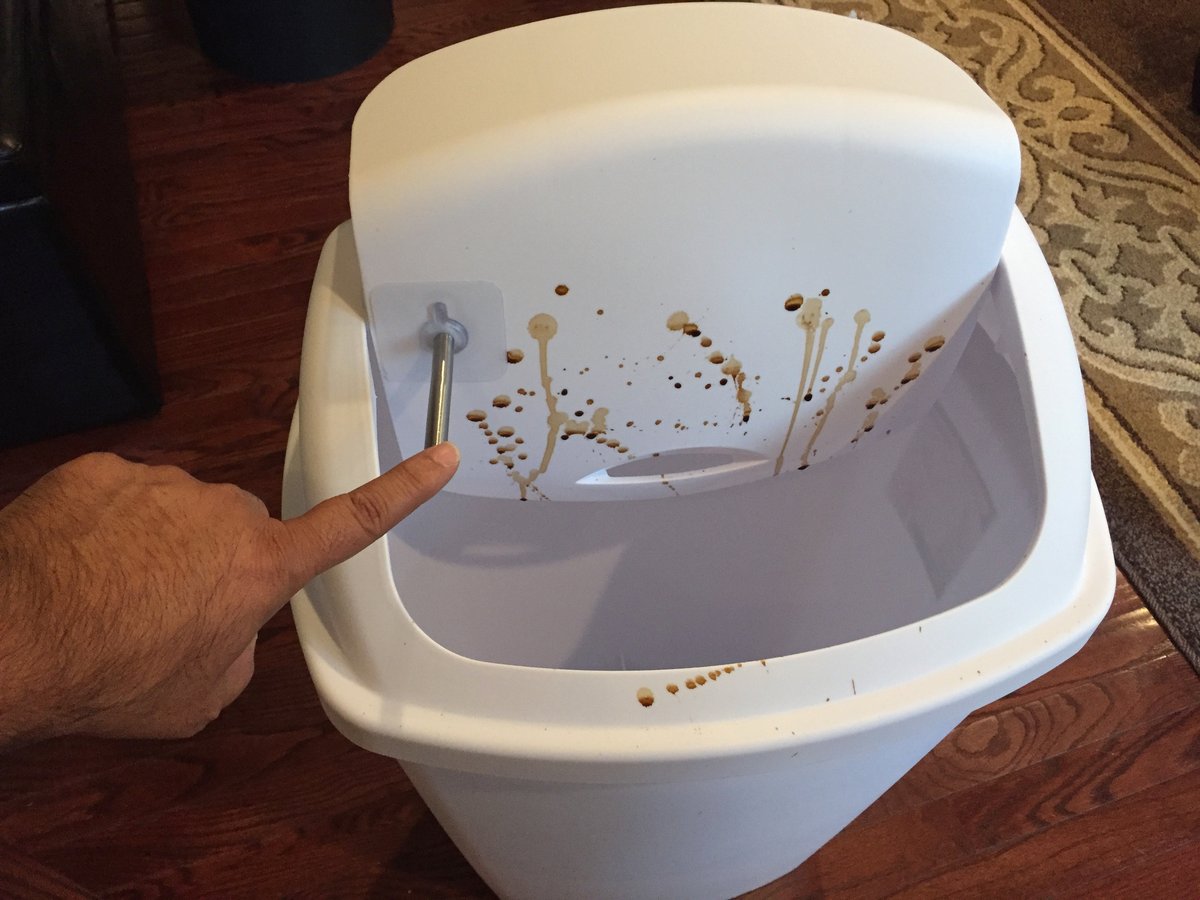 SafeHandle on white kitchen trash can